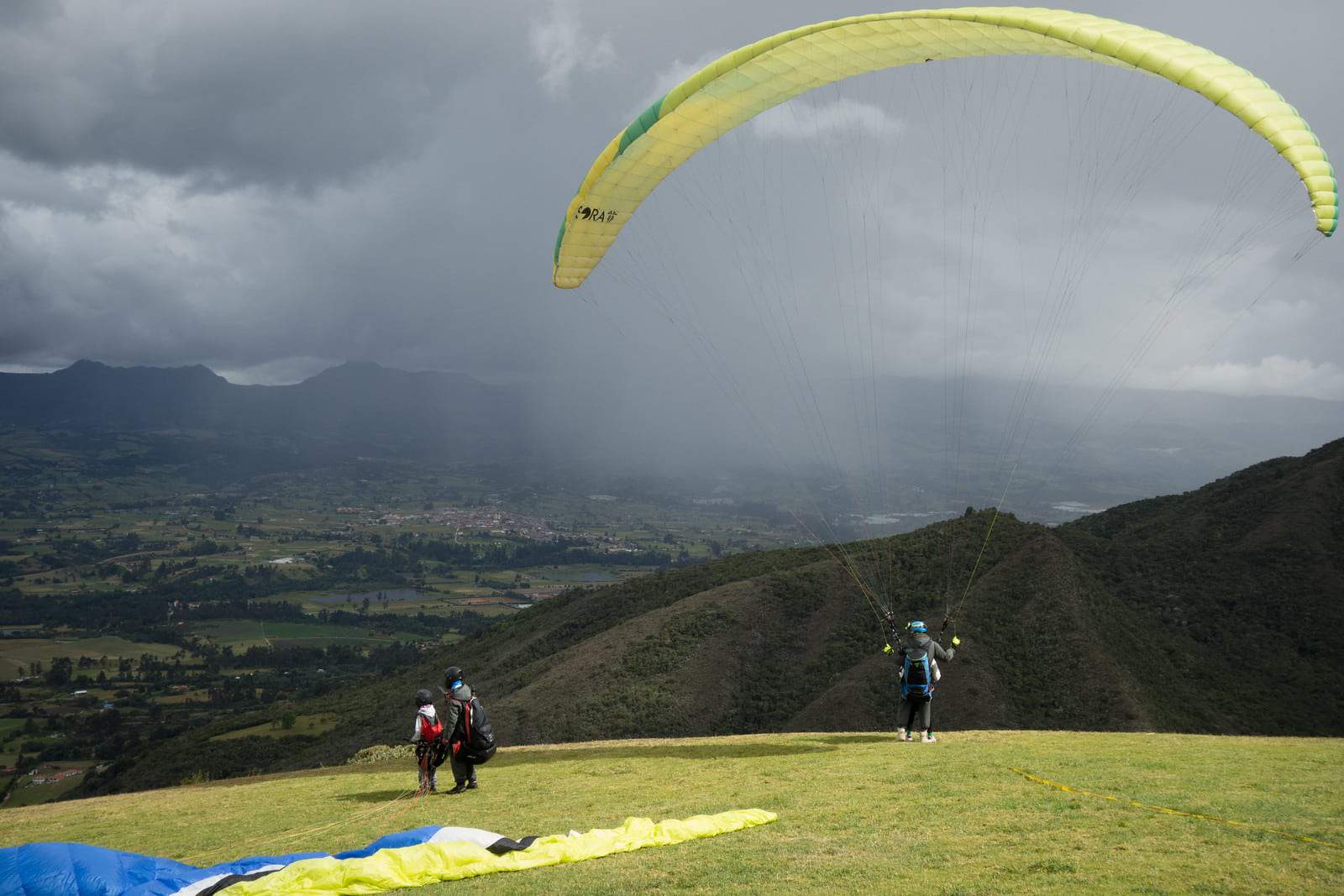 Paragliding at Sopó Colombia overlooking Embalse Tominé and Parque Pionono